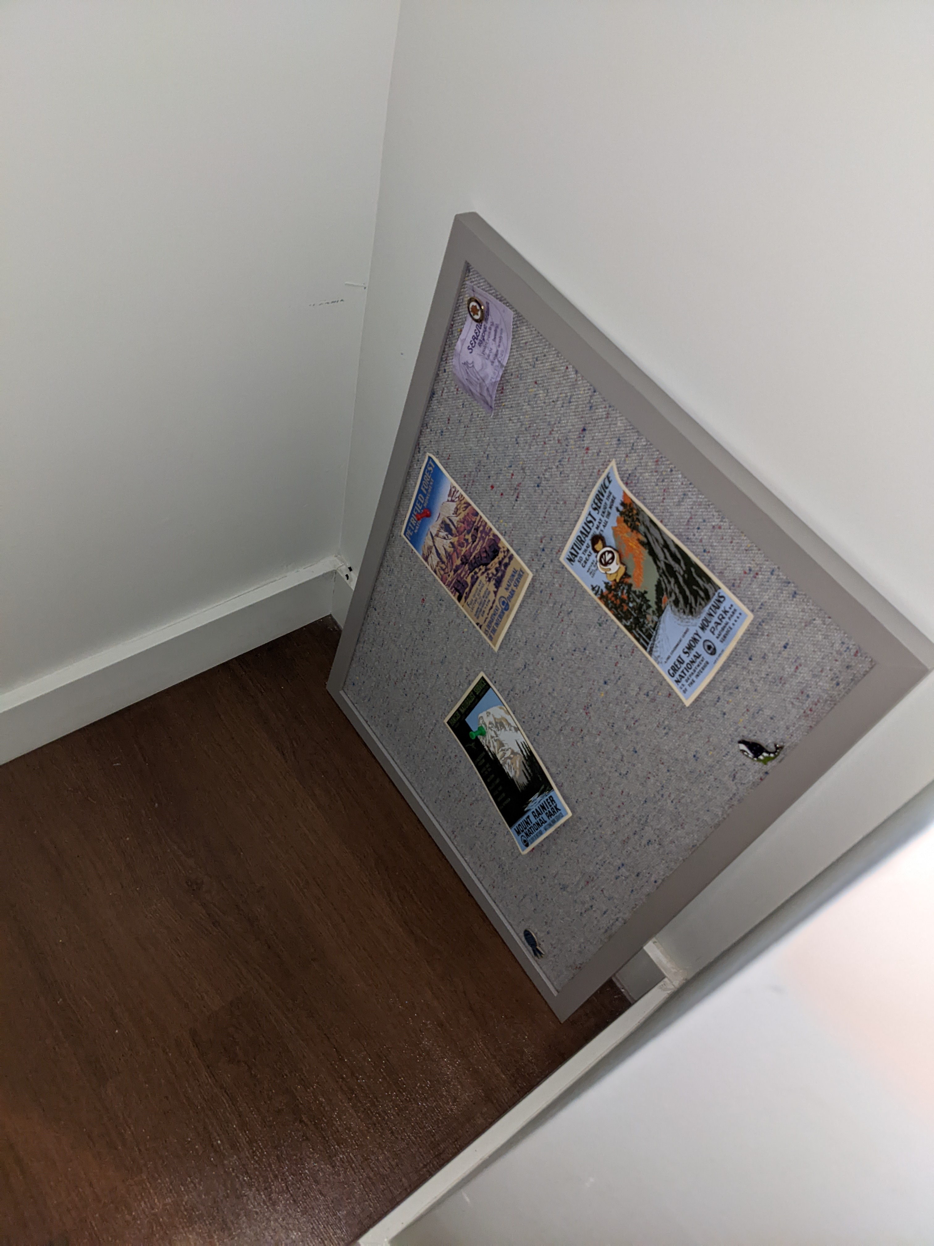 corkboard with postcards